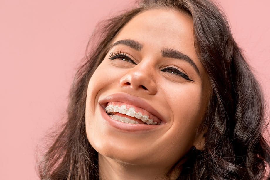 a woman smiling with braces